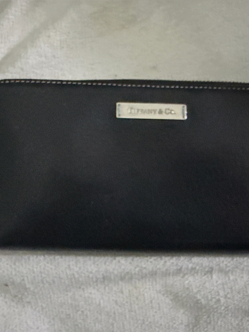 Tiffany & Co. Black Leather Men's Wallet with Silver Logo Plate